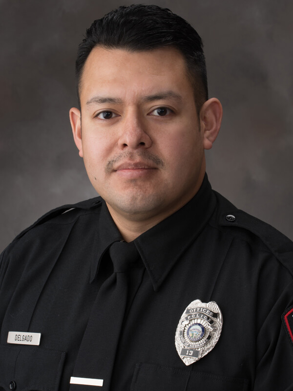 Portrait of K9 Police Officer Anderson Delgado.