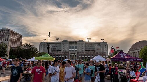 Students at an event outside Memorial Stadium