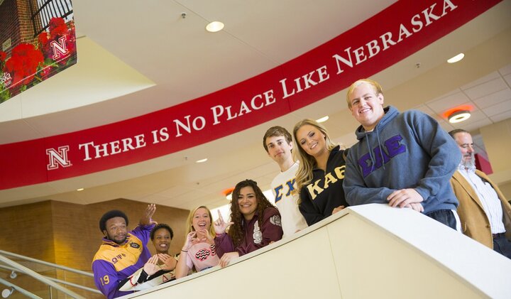 Members of the Greek System posing on stairs at the City Union.